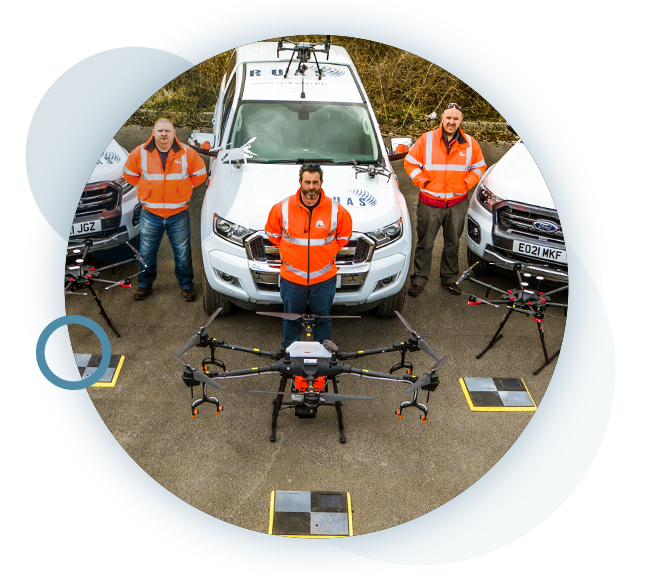 Circular image of the RUAS team, with UK CAA recognised qualifications, and their drones.